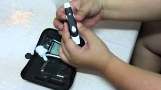 How to use your Optium Exceed Glucometer [upl. by Esadnac242]